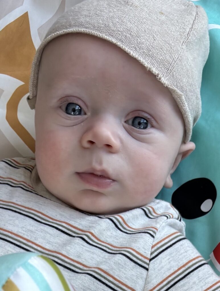 Image of baby in a hat | Positive Journal Tips